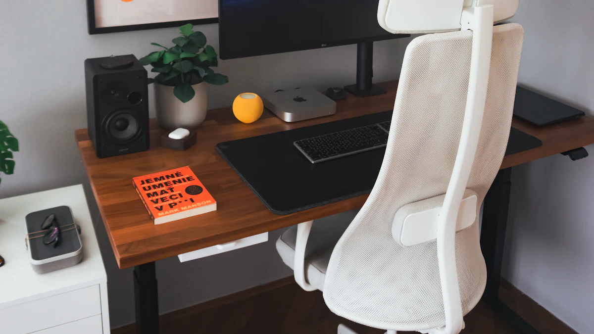 Minimalist home office desk with a monitor and keyboard, the kind of setup where desk depth determines which converter fits