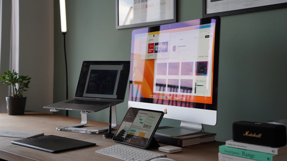 Home office desk with a laptop and an external monitor side by side, the kind of setup a desk converter is added on top of