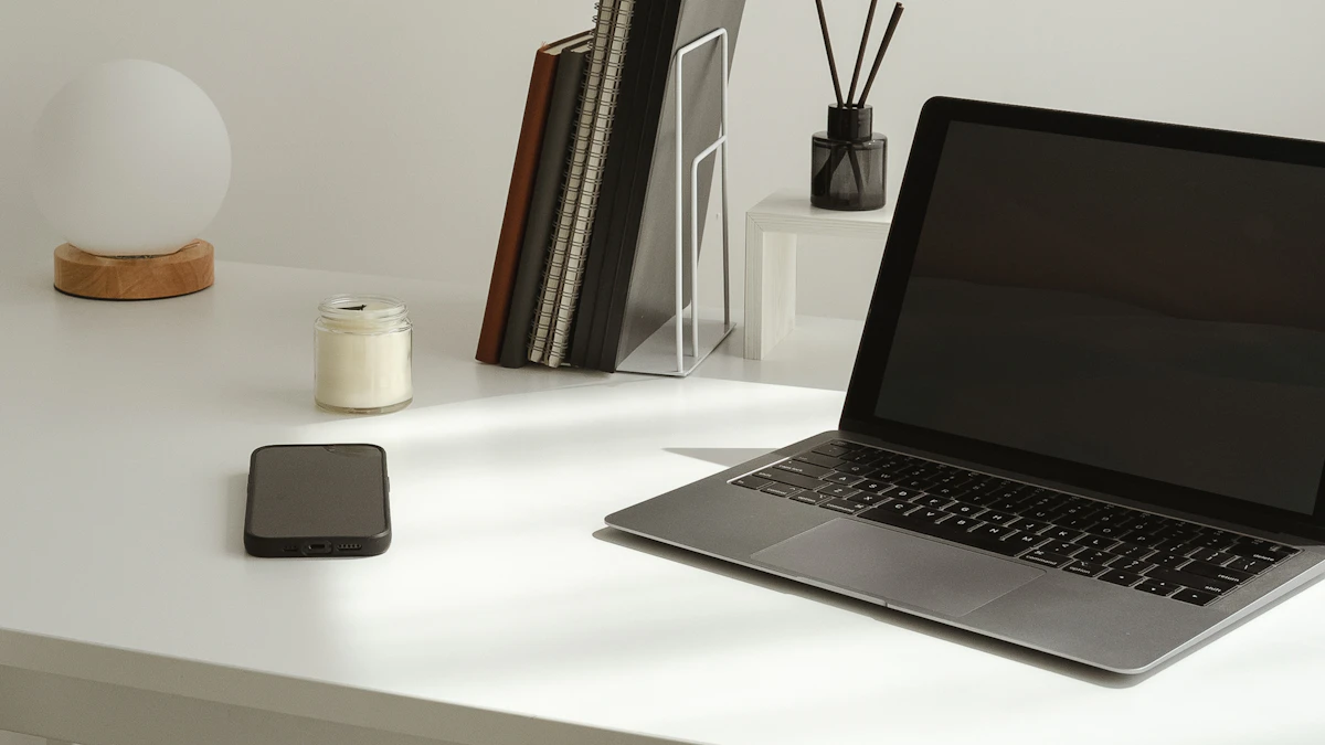 Minimal home office desk setup with a laptop and accessories, the kind of workspace where a laptop stand for ergonomics matters most
