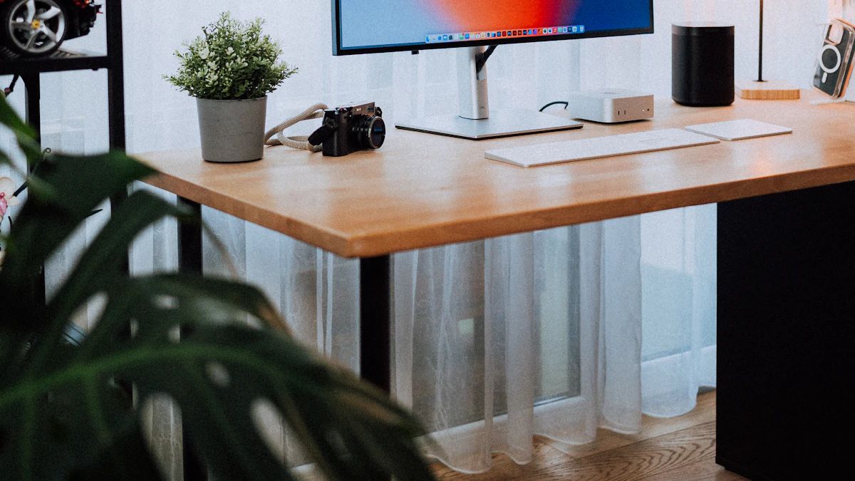 Cozy modern home office desk setup with monitor and cables running to the wall
